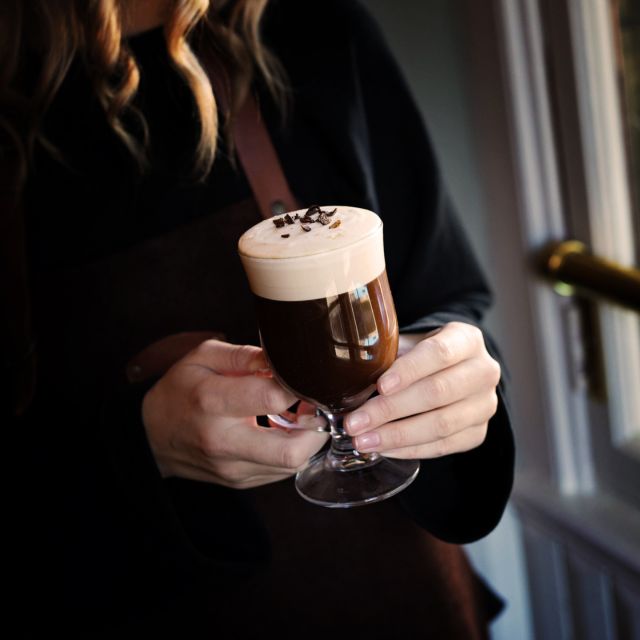 Dublin: Irish Coffee Masterclass at the Irish Whiskey Museum - The two origin theories you’ll hear before you pour