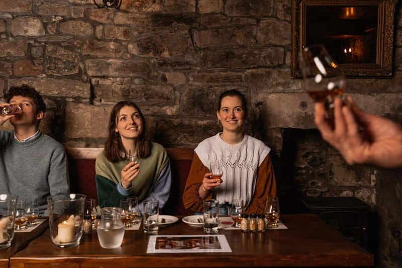 Edinburgh: Small-Group History of Whisky Tour with Tasting - Walking In Edinburgh’s Old Town From Mercat Cross