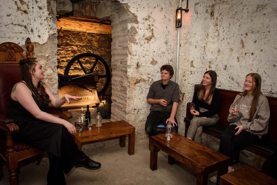 Edinburgh: Underground Vaults Tour with Whisky or Gin - Where Exactly Are the Underground Vaults on the Royal Mile?