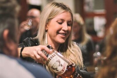 Premier Distillery & Craft Brewery Bus Tour with 9+ Tastings - Meeting at Green Light Bar and What the First Stop Feels Like